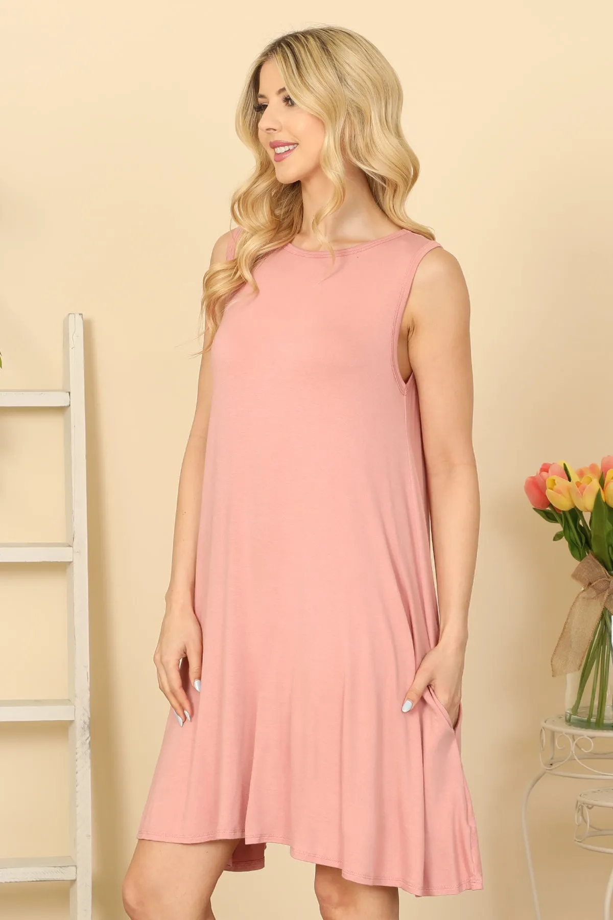 SLEEVELESS SIDE POCKET FLOWY HEM SOLID DRESS